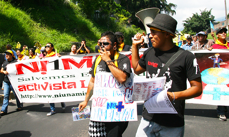 Protesters marching against mining